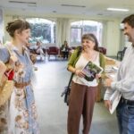Guests chatting at Womens Housing Support Program report launch