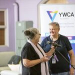Guests chatting at Womens Housing Support Program report launch