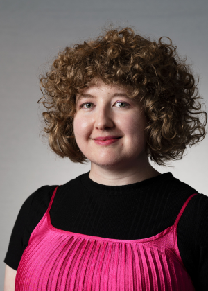 Corporate head shot of Hannah Murray